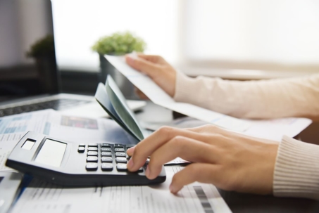 person using calculator